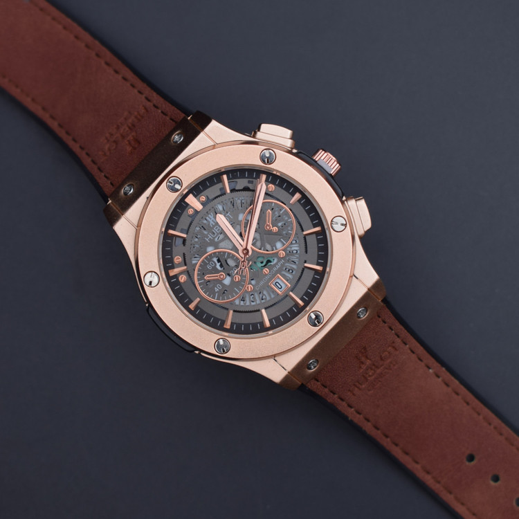 هابلوت مردانه بند قهوهای بدنه و قاب مسی با طراحی خاص و کیفیت عالی از علیدسا